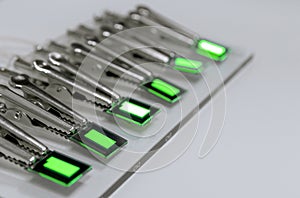 Small Creen color oled displays is lighting on a probe station. Lighting display technology.