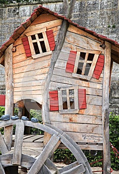 Small crooked playhouse on public playground