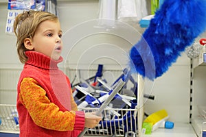 Small customer is delight by brush for dust