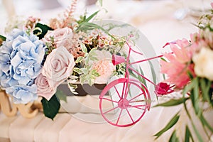 Small decorative bicycle with flowers