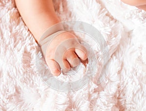 Small delicate little hand of newborn - close portrait