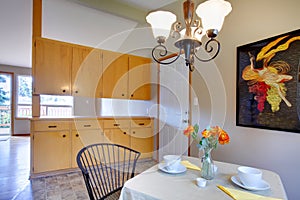 Small dining room with storage combination photo