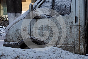 small dirty semitruck freezed in the snowdrift