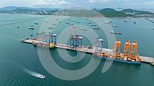 small distribution port in sea and pedestrian bridge to conect between islands and oil tankers ship floating in sea