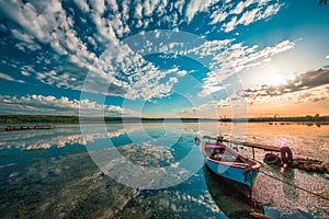 Small Dock and Boat at the lake