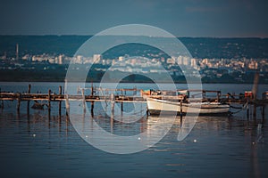 Small dock and fishing boat at fishing village