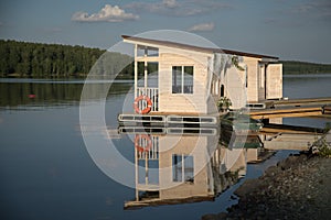 Small dock house on lake