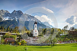 Small domed church with Wetterstein in Grainau village Germany