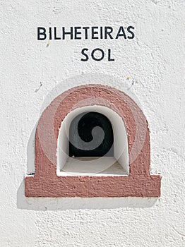 small domed window on the facade of the bullring belonging to the sale of tickets to the sun, sun in the village of Coruche