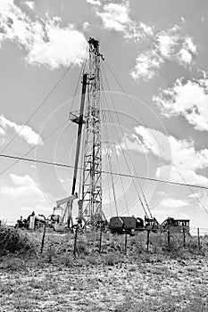 Small  drilling Oil Rig in West Texas photo