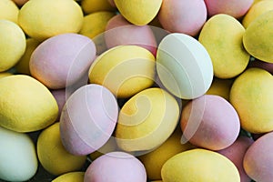 Small Easter Eggs. Pastel colored small coated chocolate Easter eggs