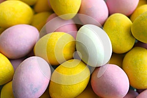 Small Easter Eggs. Pastel colored small coated chocolate Easter eggs