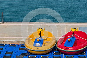 Small electric boats for children at marina