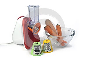 Small electric household appliances for raping and cutting vegetables photo