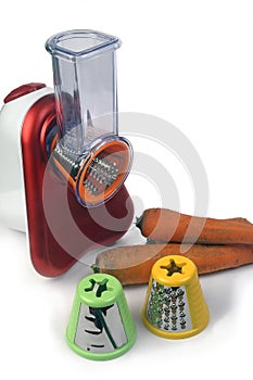 Small electric household appliances for raping and cutting vegetables photo
