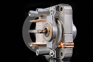 Small electric motor for the oven. Household appliance repair accessories