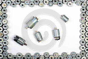 Small electrical motors on white table