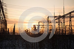 A small electrical substation at sunset