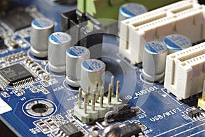small electronic components on top of a motherboard