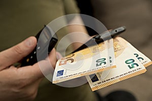 Small electronic password generator used for banking security on on euro banknotes.