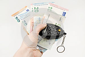 Small electronic password generator used for banking security on on euro banknotes.