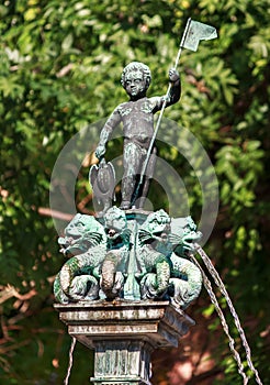 Small elegant baroque fountain on the Schlossplatz in Worms, Germany