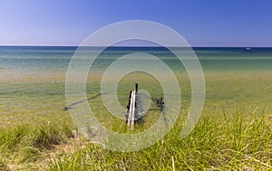 Small empty boating dock at lake Michigan shore