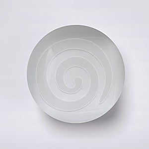 Small empty white dish isolated