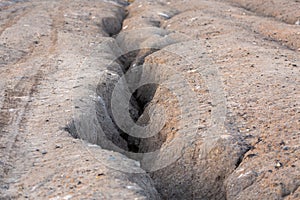 small erosive ravine in weak sandy soil