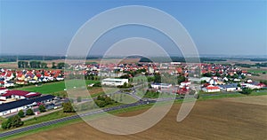 Small European city aerial view. german village aerial view. Agricultural fields near a small town. european landscape
