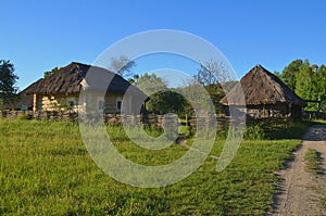 Small fancy wooden houses with stalled roofs