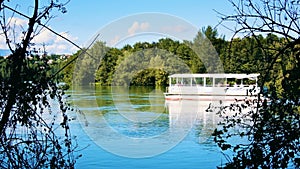 Small ferry crossing a river