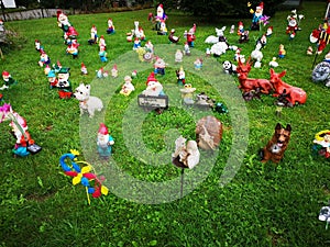 Small figurines in a garden on the grass