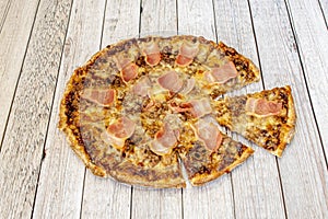 Small Fine Wheat Dough Pizza with BBQ Sauce with Huge Fried Bacon Slices