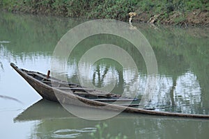 Small fisher boats display with water reflection on a local tourist spot.