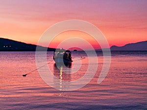 Small Fishing Boat in Corinthian Gulf Bay at Dawn, Greece