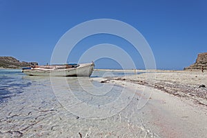 Small fishing boat at lagoon Balos