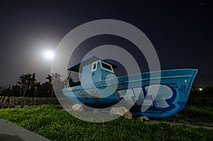 Small fishing boat - a monument on the Mediterranean coast