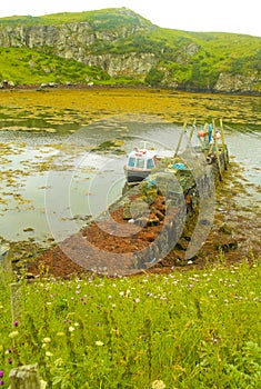 Small Fishing Boat Moored at a Jetty, Harris, Scotland