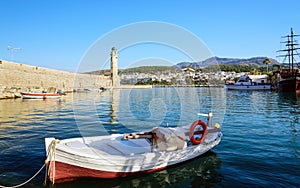 Small fishing boat at port of Rethimno town on Crete island