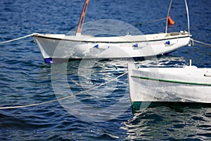 Small fishing boat on the sea water in a sea bay