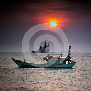Small fishing boat in South China Sea, Vung Tau, Vietnam photo
