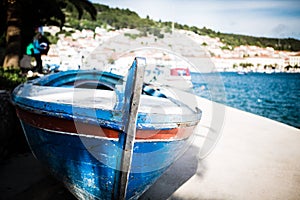 Small fishing boat on sunny morning in Vela Luka,Korcula Island, Croatia photo