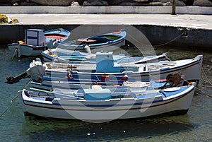 Small fishing boats docked at the quayside on the Greek island of Donoussa.