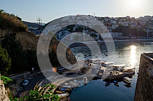 Small fishing boats marina with round pier