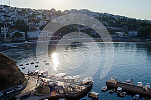 Small fishing boats marina with round pier