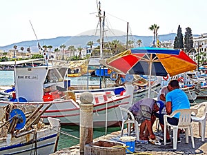 Small fishing boats in the port of Kos in Greece
