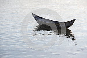 Small fishing boats refection on the fjord part 4