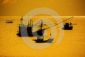 Small fishing boats in  the sea sea in Twilight time