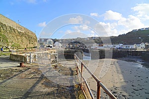 Small fishing harbour at low tide